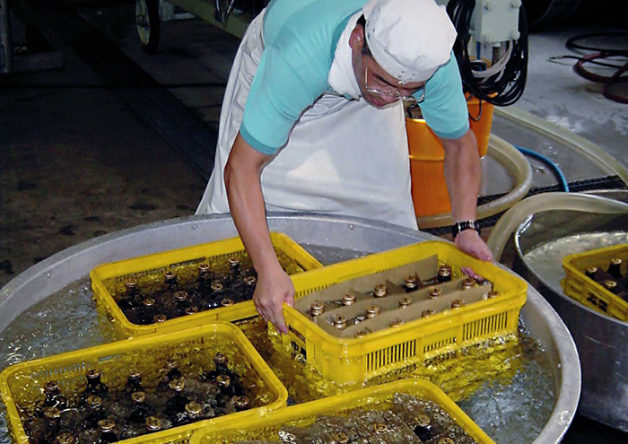 Bottles are rapidly cooled after heating to ensure no loss of quality.